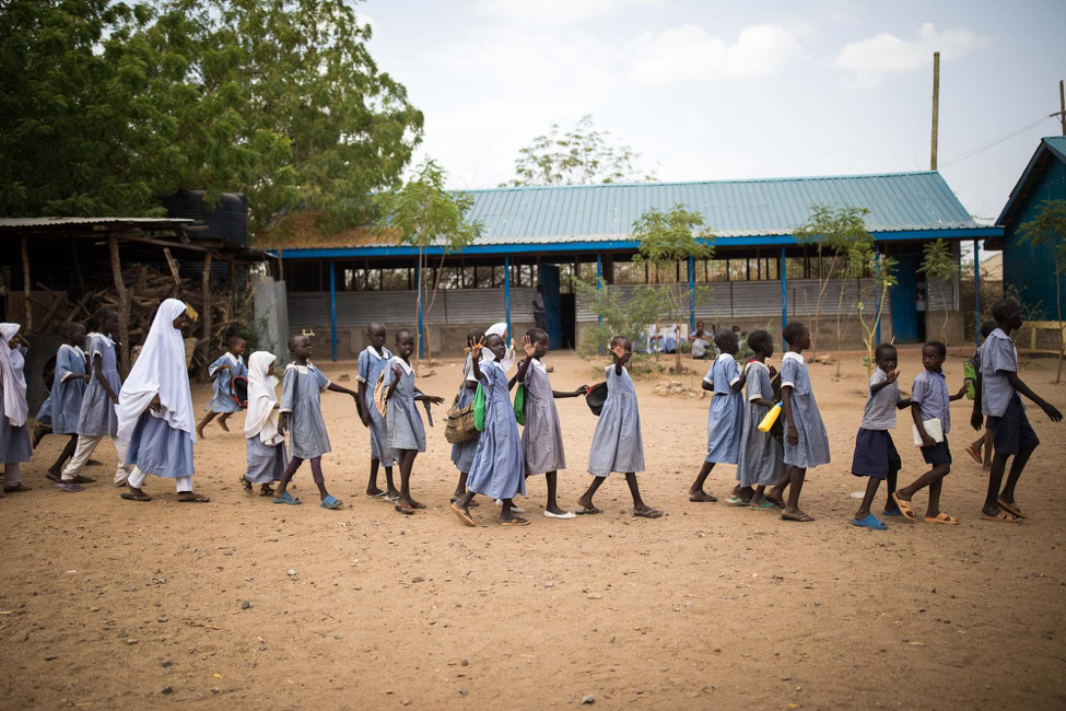 Girls walking to school in Kakuma refugee camp in Kenya © WUSC/ Lorenzo Moscia